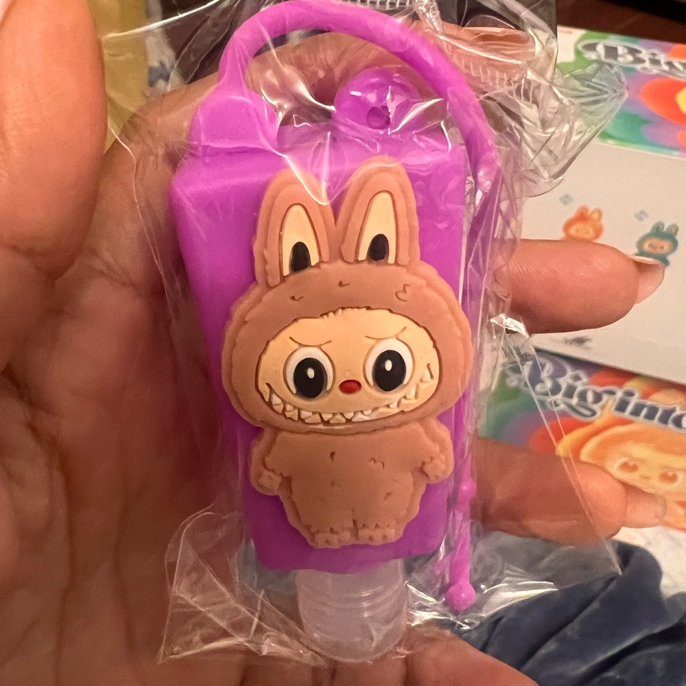 Adorable Purple and Brown labubu keychain sanitizer holder Accessory